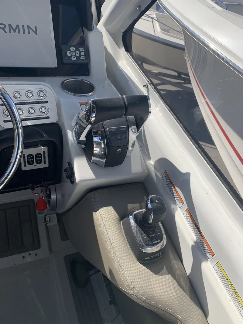 Slide: The Image of 2022 Finseeker 280 DC boat bathroom with granite countertop and modern fixtures. - 15