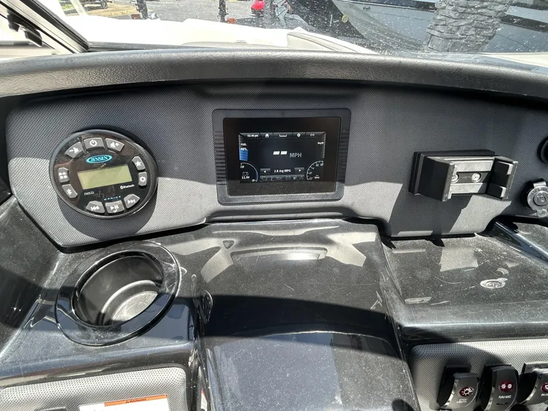 Slide: The Image of Dashboard of 2022 Yamaha Boats SX190 with digital display and controls. - 4