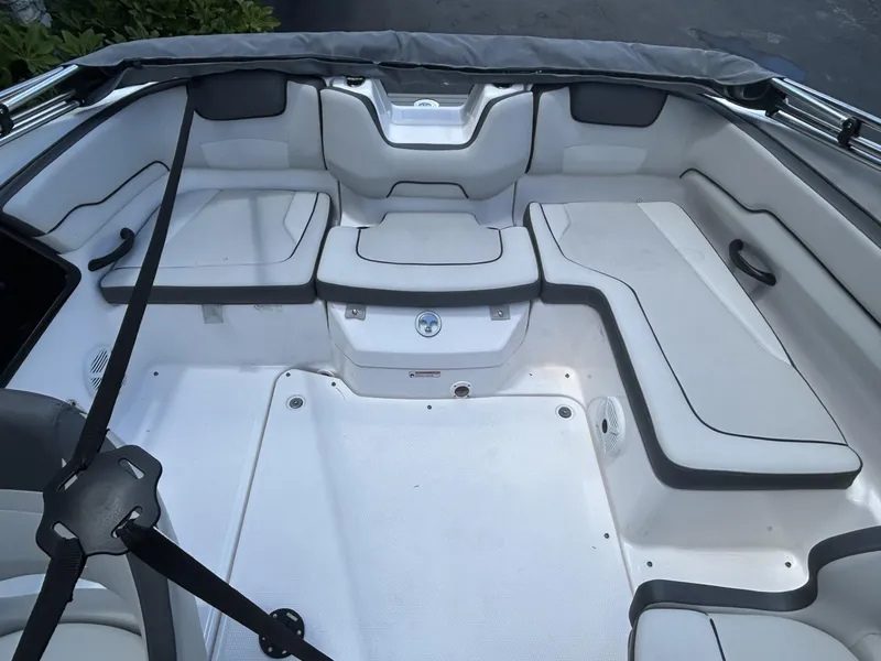 Slide: The Image of 2022 Yamaha Boats SX190 interior with spacious seating and sleek design. - 7