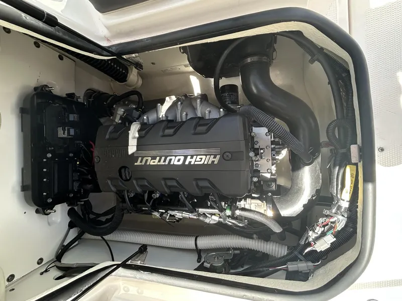 Slide: The Image of 2022 Yamaha Boats SX190 engine compartment showcasing high output engine components. - 8