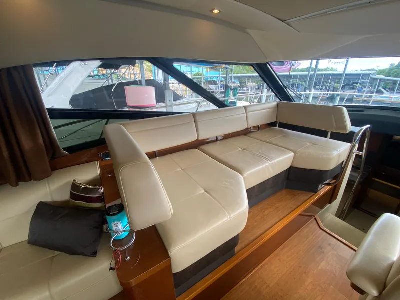 Slide: The Image of Luxurious interior of 2015 Sea Ray 470 Sundancer yacht with beige leather seating. - 18