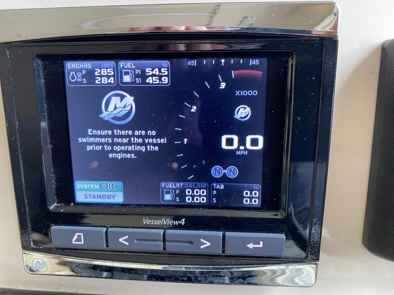 Slide: The Image of Display screen of a 2015 Sea Ray 470 Sundancer showing engine and fuel information. - 21