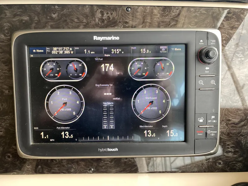 Slide: The Image of Raymarine display on 2015 Sea Ray 470 Sundancer showing navigation and engine data. - 23