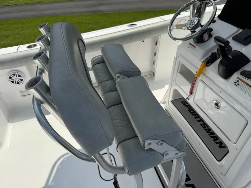 Slide: The Image of 2019 Sportsman Open 232 Center Console boat interior with helm and seating. - 18