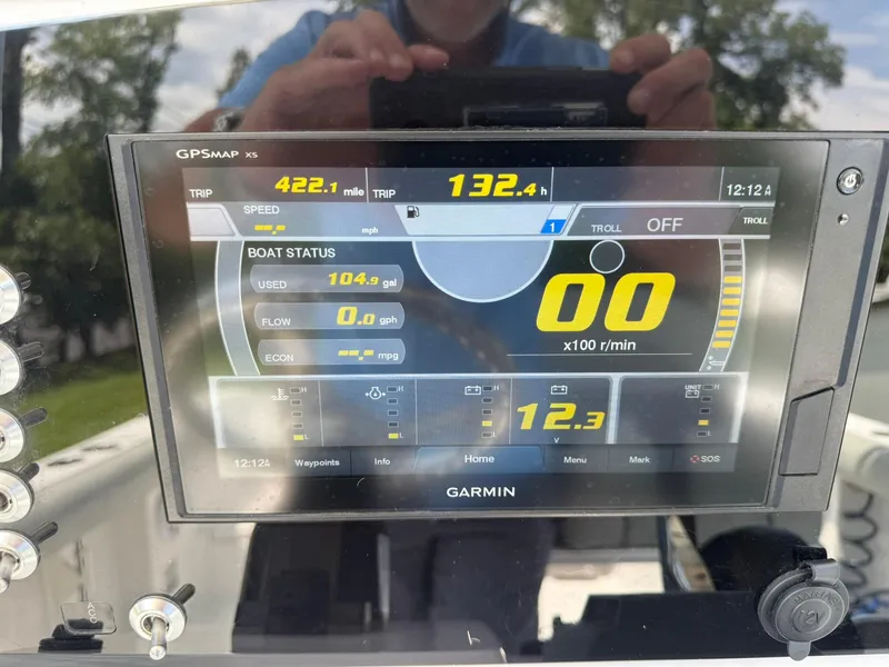 Slide: The Image of Garmin GPS display on 2019 Sportsman Open 232 Center Console boat showing trip data. - 20