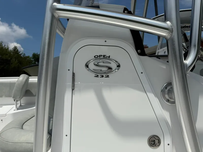 Slide: The Image of 2019 Sportsman Open 232 Center Console boat, featuring sleek design and sturdy metal framework. - 7