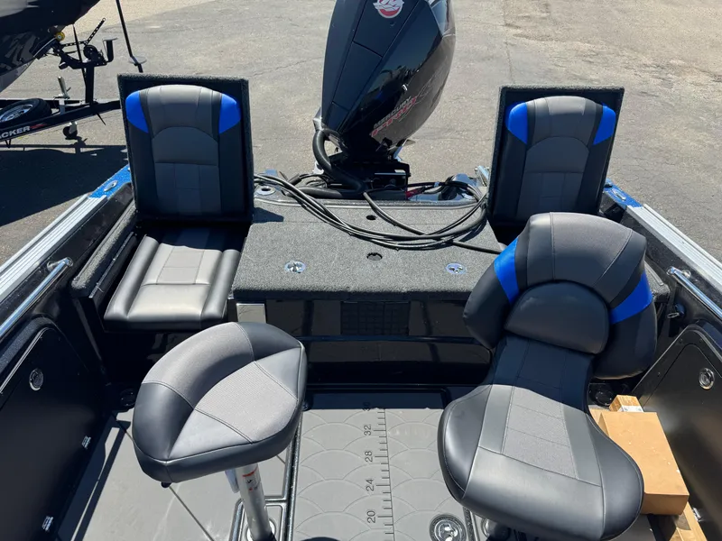 Slide: The Image of Interior of 2025 Nitro ZV20 Sport Pro boat with seating and motor. - 7