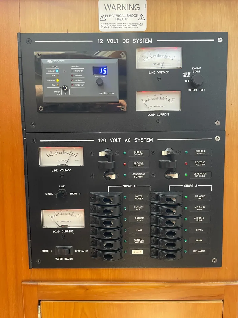 Slide: The Image of Electrical control panel on a 2007 True North 38 boat, featuring DC and AC systems. - 20