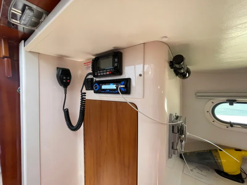 Slide: The Image of Interior of 2007 True North 38 boat with communication equipment and window. - 23