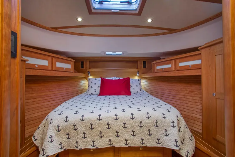 Slide: The Image of Luxurious bathroom in 2026 Sabre 45 Salon Express yacht with wooden cabinetry and modern fixtures. - 13