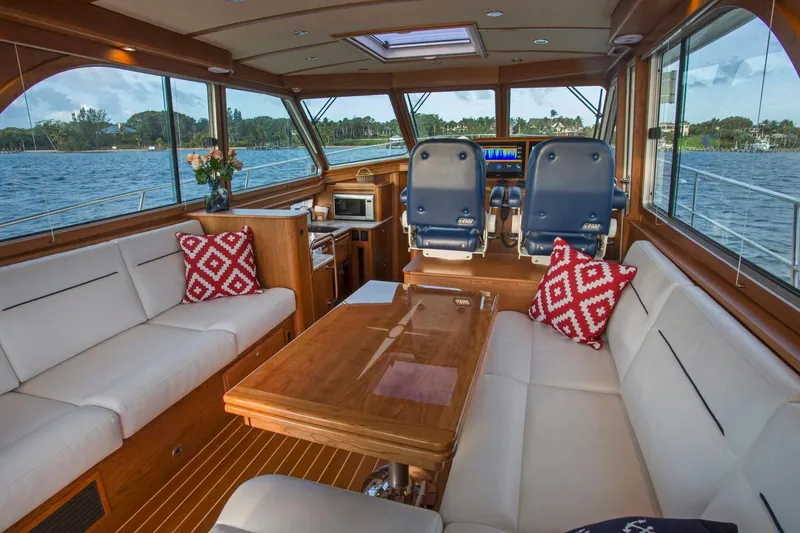 Slide: The Image of Interior of 2026 Sabre 45 Salon Express yacht with helm and navigation system. - 8