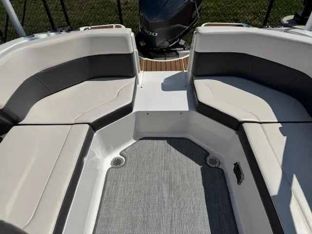 Slide: The Image of 2017 Chaparral 250 Suncoast boat interior with spacious seating and modern design. - 21