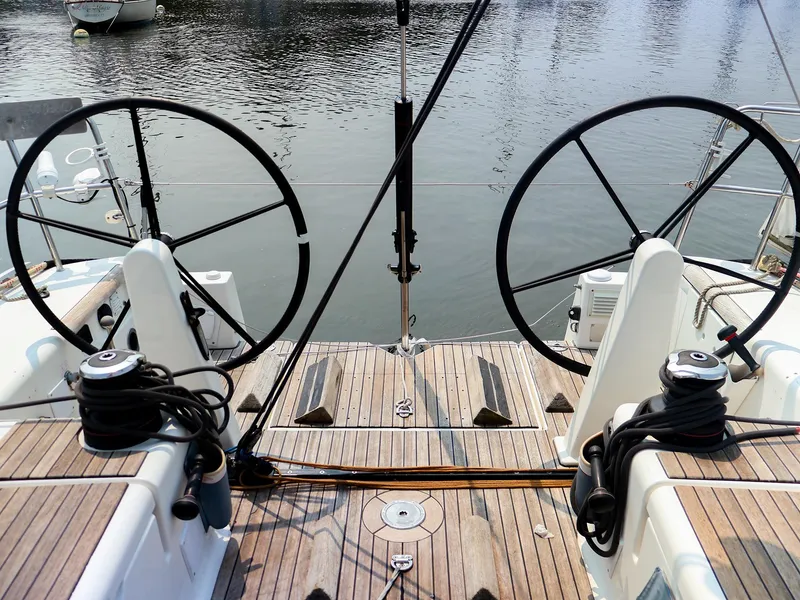 Slide: The Image of Dufour 40E Performance 2011 sailboat cockpit with dual steering wheels and teak decking. - 20