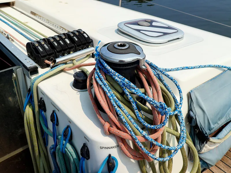 Slide: The Image of Sailing ropes and winch on a 2011 Dufour 40E Performance yacht deck. - 25