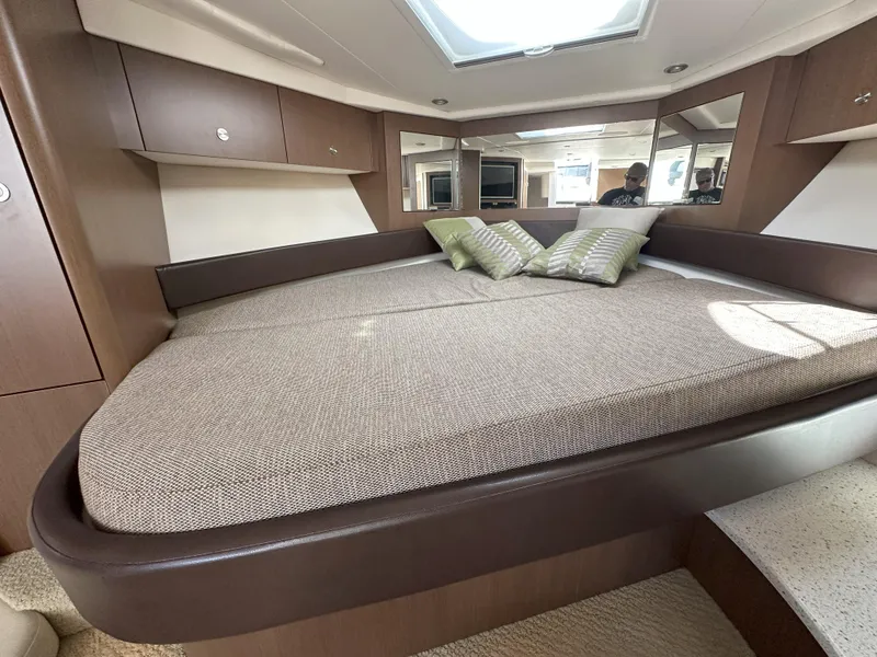 Slide: The Image of Luxurious interior cabin of 2015 Sea Ray 350 Sundancer yacht with comfortable bedding. - 20