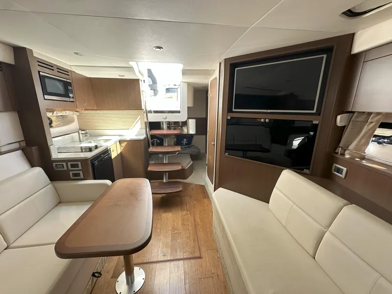 Slide: The Image of Luxurious interior of 2015 Sea Ray 350 Sundancer yacht with modern amenities and elegant design. - 21