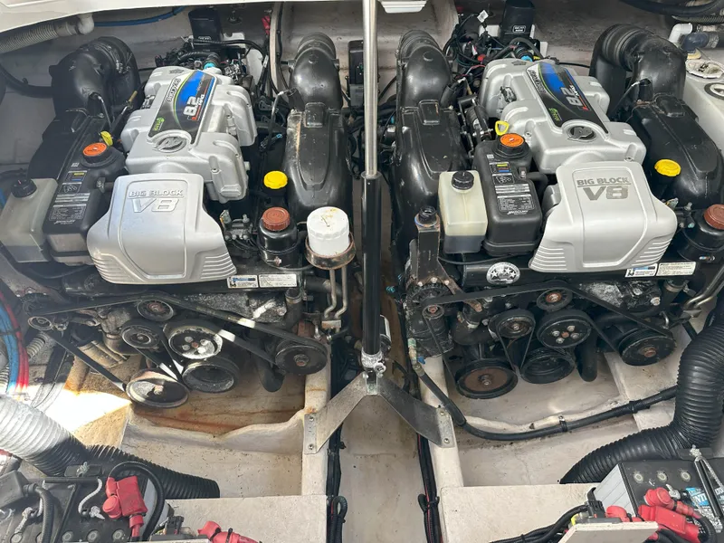Slide: The Image of Twin V8 engines in a 2015 Sea Ray 350 Sundancer boat. - 28