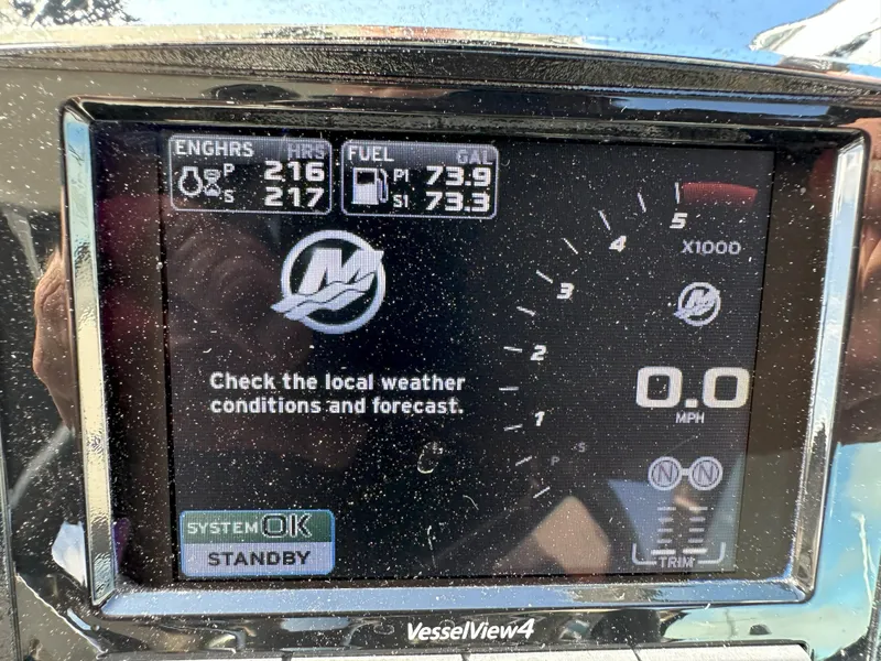 Slide: The Image of Display screen of a 2015 Sea Ray 350 Sundancer showing engine and fuel data. - 30