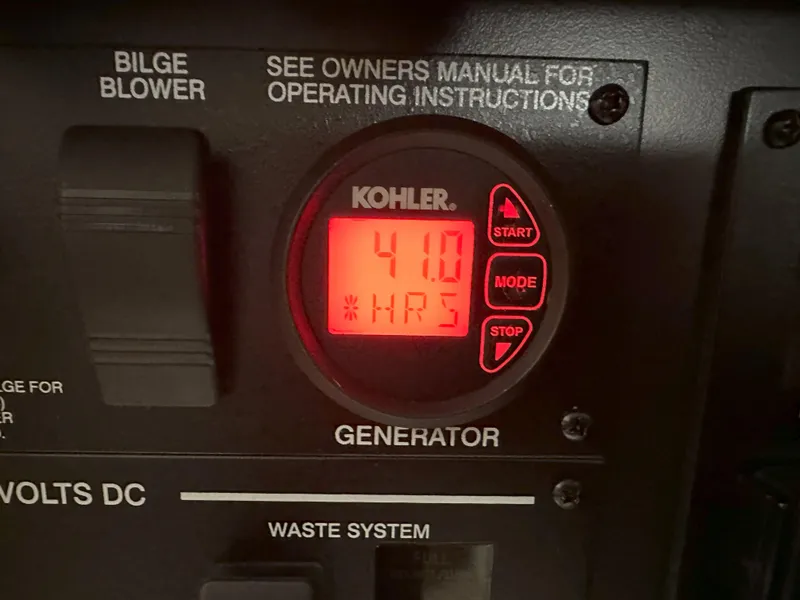 Slide: The Image of Kohler generator display showing 41.0 hours on a 2015 Sea Ray 350 Sundancer. - 31