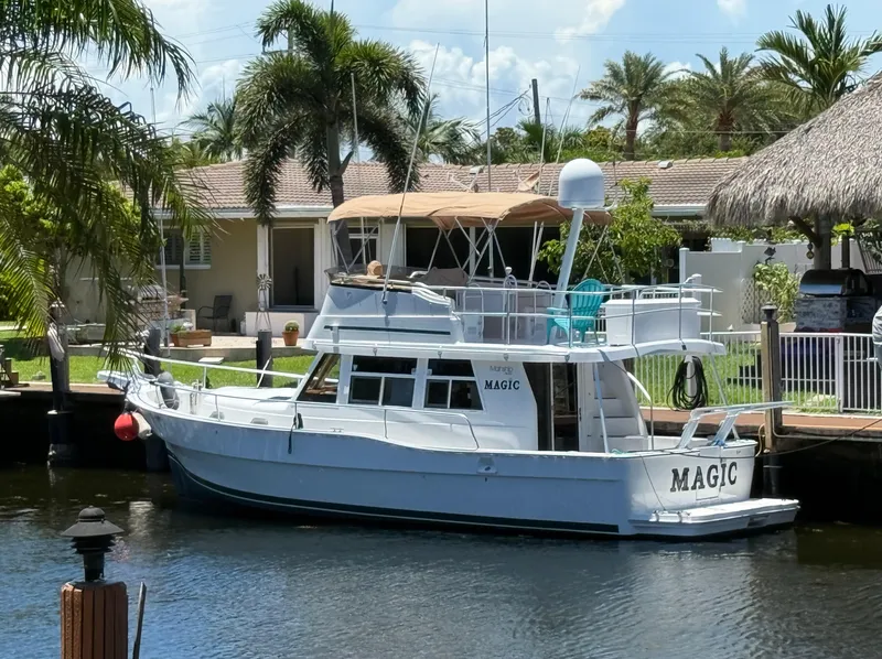 Slide: The Image of JFA's M/Y Magic 2001 Mainship 390 in Pompano, FL - 1