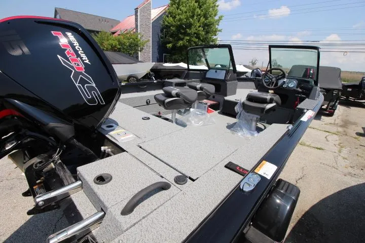 Slide: The Image of 2025 Lund 1875 Impact XS Sport boat with Mercury Pro XS engine, spacious interior. - 8