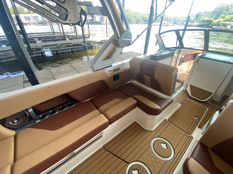 Slide: The Image of Luxurious interior of 2022 MasterCraft X26 boat with elegant seating and wood-style flooring. - 23