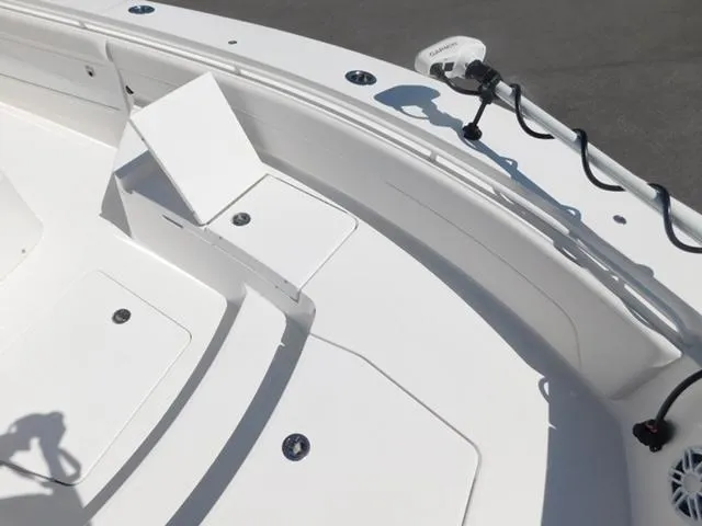 Slide: The Image of 2024 Regulator 30XO boat deck with seating and trolling motor. - 23