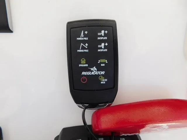 Slide: The Image of Control panel of 2024 Regulator 30XO boat with power pole and jackplate options. - 31