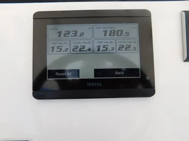 Slide: The Image of Digital display on 2024 Regulator 30XO showing trip data and fuel usage. - 38