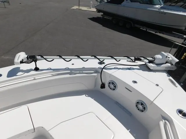Slide: The Image of 2024 Regulator 30XO boat deck with trolling motor and speakers. - 45