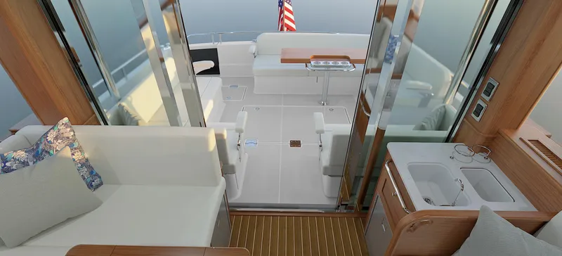 Slide: The Image of Luxurious interior of 2027 Sabre 51 Salon Express yacht with elegant wood finishes. - 10