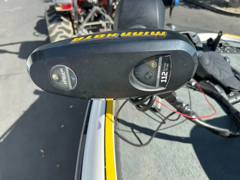 Slide: The Image of Close-up of a Minn Kota trolling motor on a 2004 Triton Tr-20XDC boat. - 25