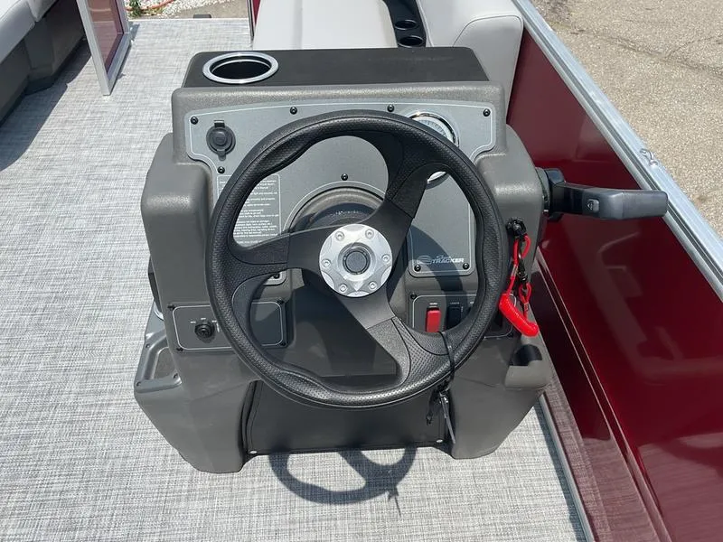 Slide: The Image of Steering console of 2026 Sun Tracker PB 16 DLX pontoon boat. - 10