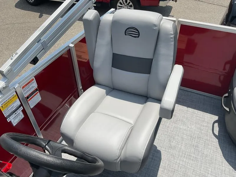 Slide: The Image of Captain's chair on 2026 Sun Tracker PB 16 DLX pontoon boat, featuring gray upholstery. - 12