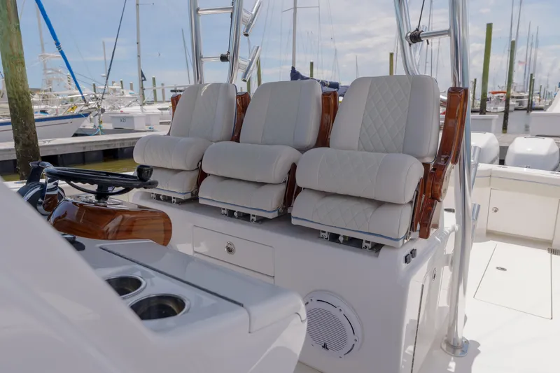 Slide: The Image of 2022 Valhalla Boatworks V41 helm with luxurious seating and polished wood accents. - 17