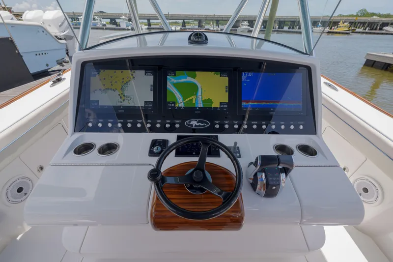 Slide: The Image of 2022 Valhalla V41 boat helm with advanced navigation displays and controls. - 20