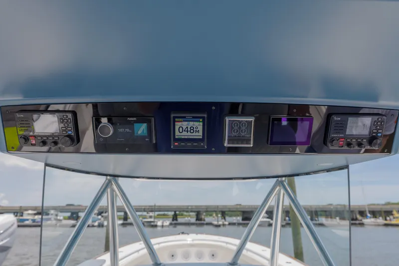Slide: The Image of 2022 Valhalla Boatworks V41 dashboard with advanced navigation and communication systems. - 21