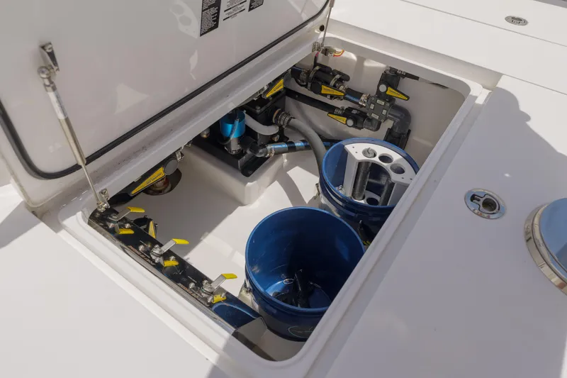 Slide: The Image of 2022 Valhalla Boatworks V41 interior compartment with plumbing and storage features. - 35
