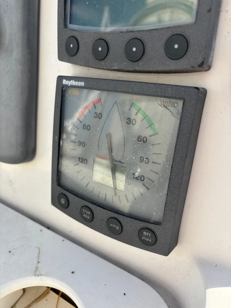 Slide: The Image of Raytheon wind gauge on 2001 Hunter 460 sailboat dashboard. - 30