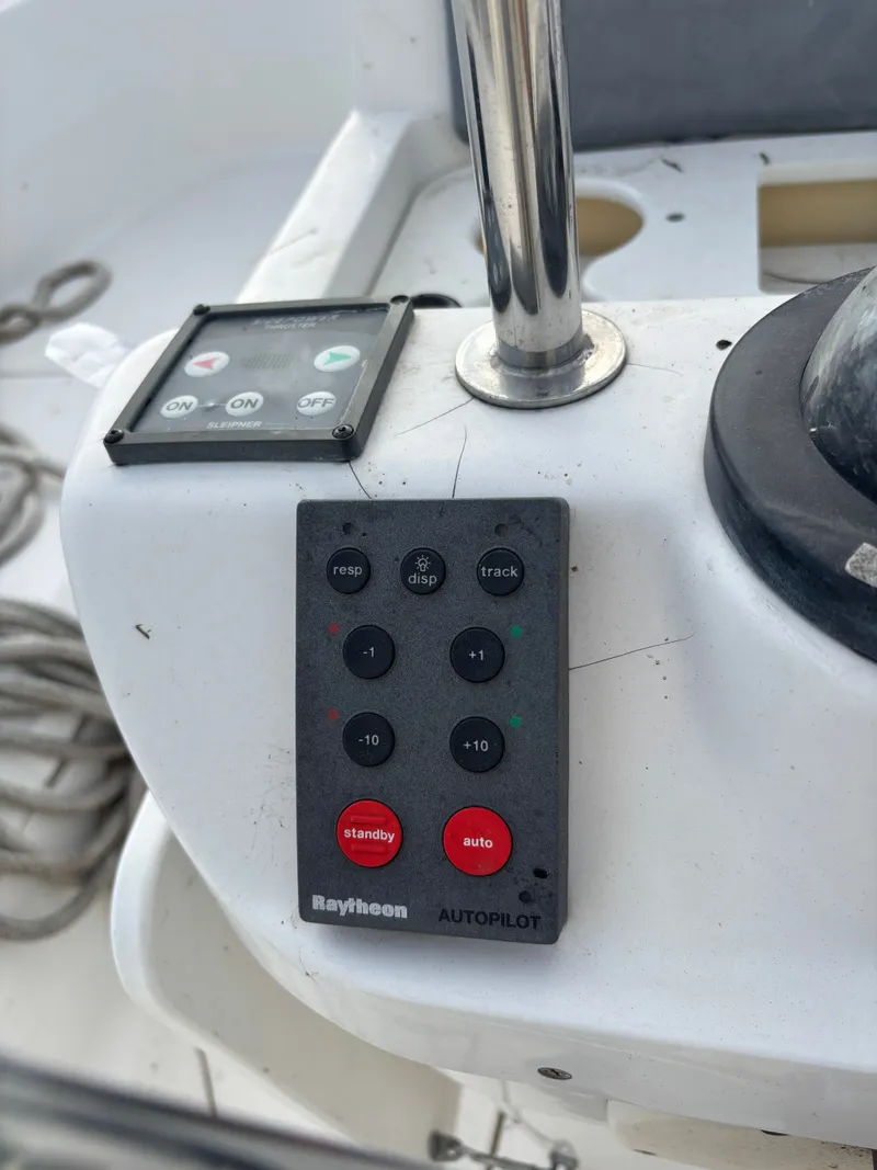 Slide: The Image of Raytheon autopilot control panel on 2001 Hunter 460 sailboat. - 34