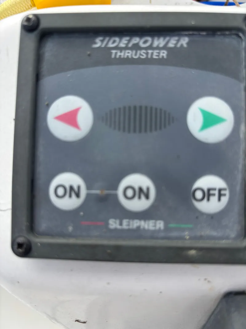 Slide: The Image of Control panel of a Sidepower thruster on a 2001 Hunter 460 boat. - 37