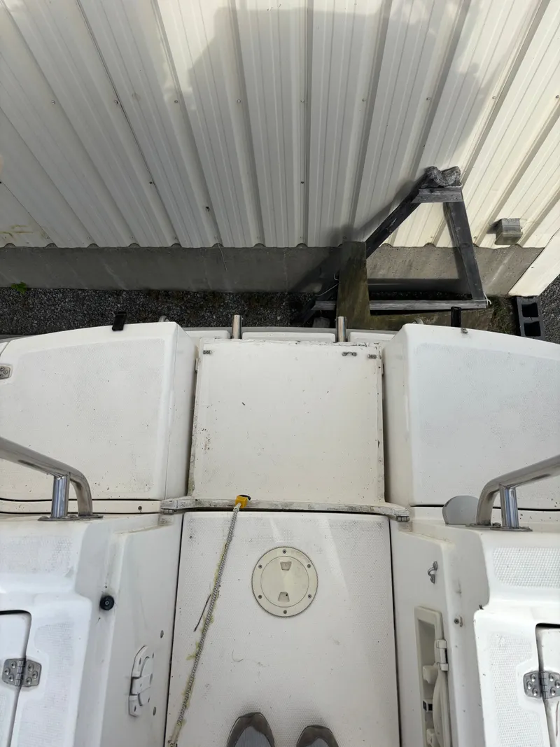 Slide: The Image of Top view of a 2001 Hunter 460 boat deck near a metal building. - 46