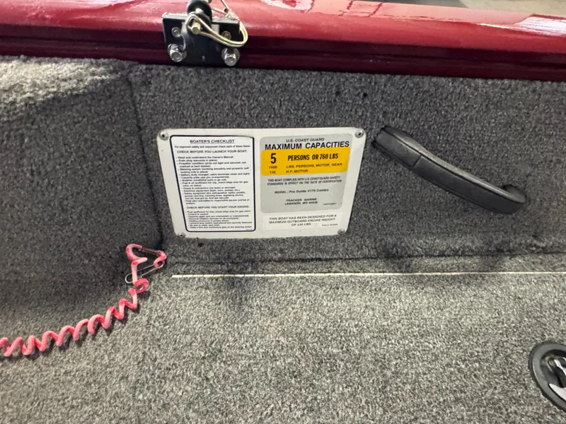 Slide: The Image of 2014 Tracker Pro Guide V-175 Combo boat capacity label, 5 persons or 760 lbs limit. - 9