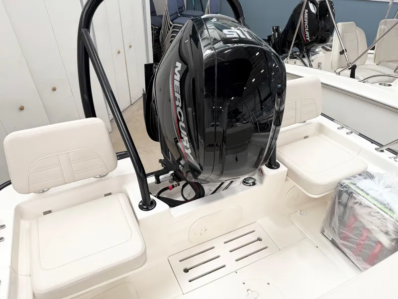 Slide: The Image of 2025 Boston Whaler 170 Montauk with Mercury engine, interior view. - 3