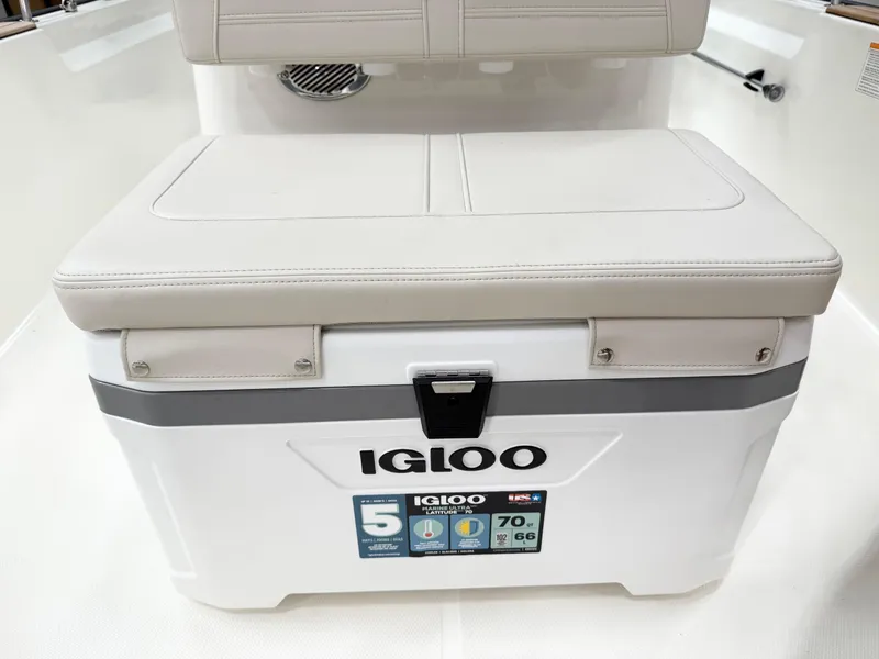 Slide: The Image of 2025 Boston Whaler 170 Montauk with Igloo cooler seat, featuring cushioned top. - 9