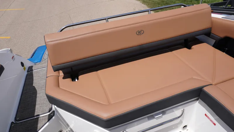 Slide: The Image of 2022 Cobalt R6 boat with tan leather seating, rear view. - 17