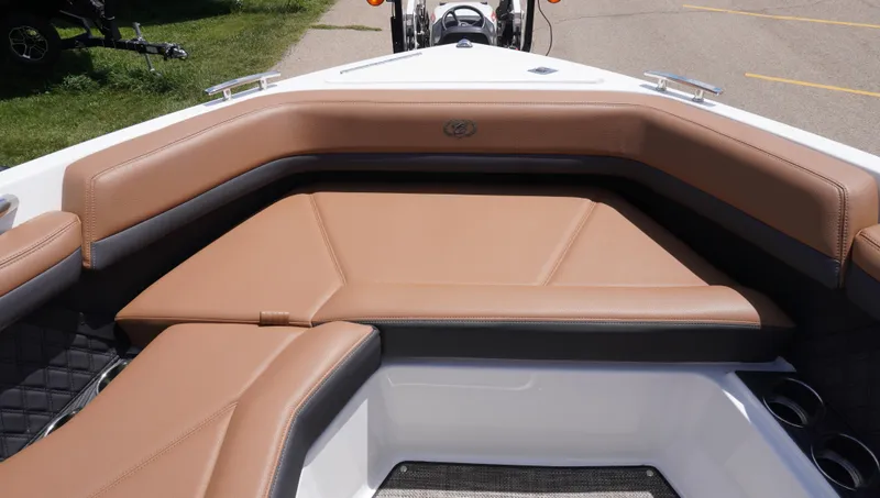 Slide: The Image of 2022 Cobalt R6 boat interior with tan leather seating and modern design. - 30