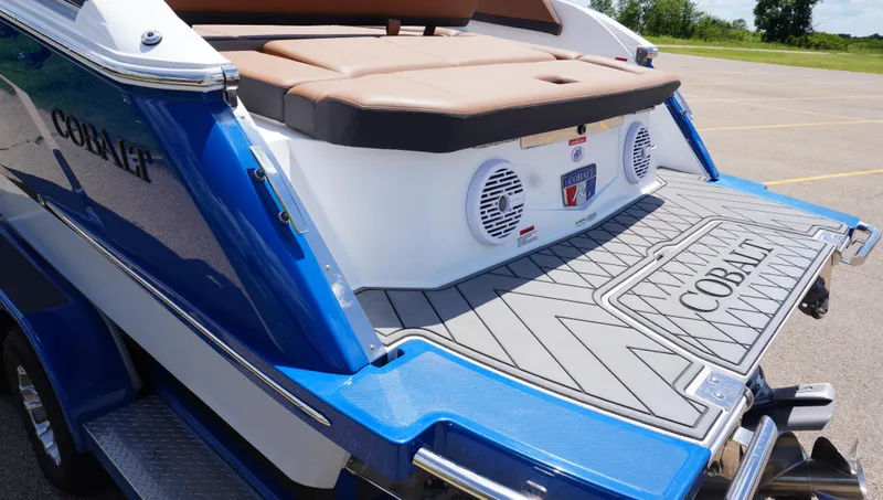 Slide: The Image of 2022 Cobalt R6 boat rear view with swim platform and speakers. - 7