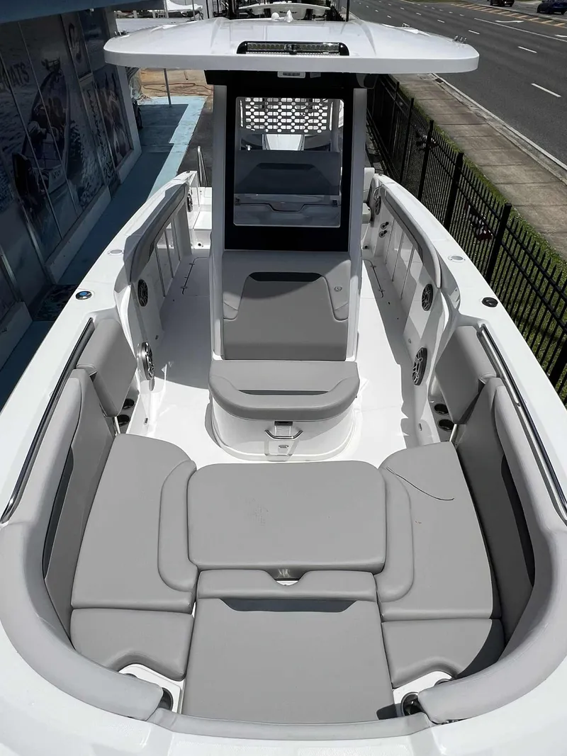 Slide: The Image of 2025 Hurricane Center Console 24 OB boat with spacious seating and modern design. - 4