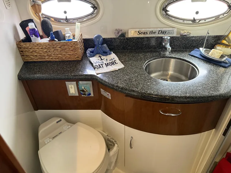 Slide: The Image of Bathroom interior of 2007 Carver 40 Motor Yacht with sink and toiletries. - 22
